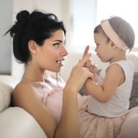 sweet-mom-talking-to-her-beautiful-daughter